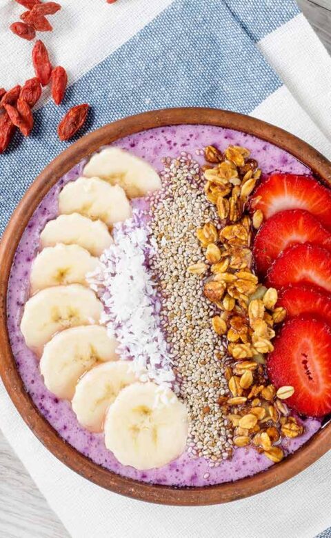 healthy acai bowl with fresh strawberries