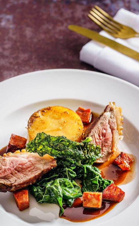 a meat fine dining dish on white plate